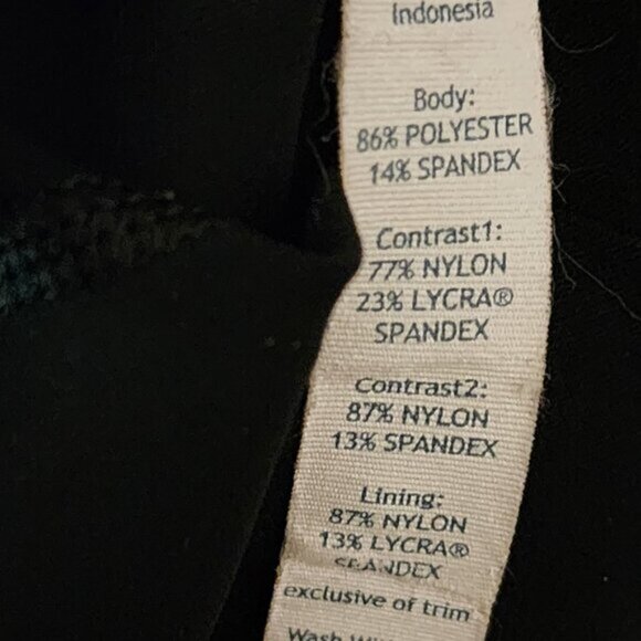 Lululemon Black Pleated Pace Setter Skirt w/ Built In Shorts - Picture 6 of 6